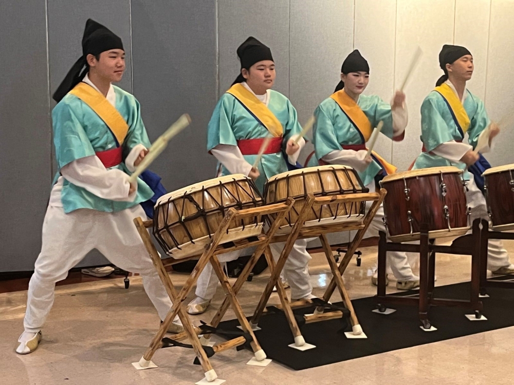 Youth play traditional Korean drums during a performance at a luncheon following the 50th anniversary Mass for St. Andrew Kim Parish in Olney, Maryland, on Sept. 29, 2024. (Catholic Standard photo by Mark Zimmermann)